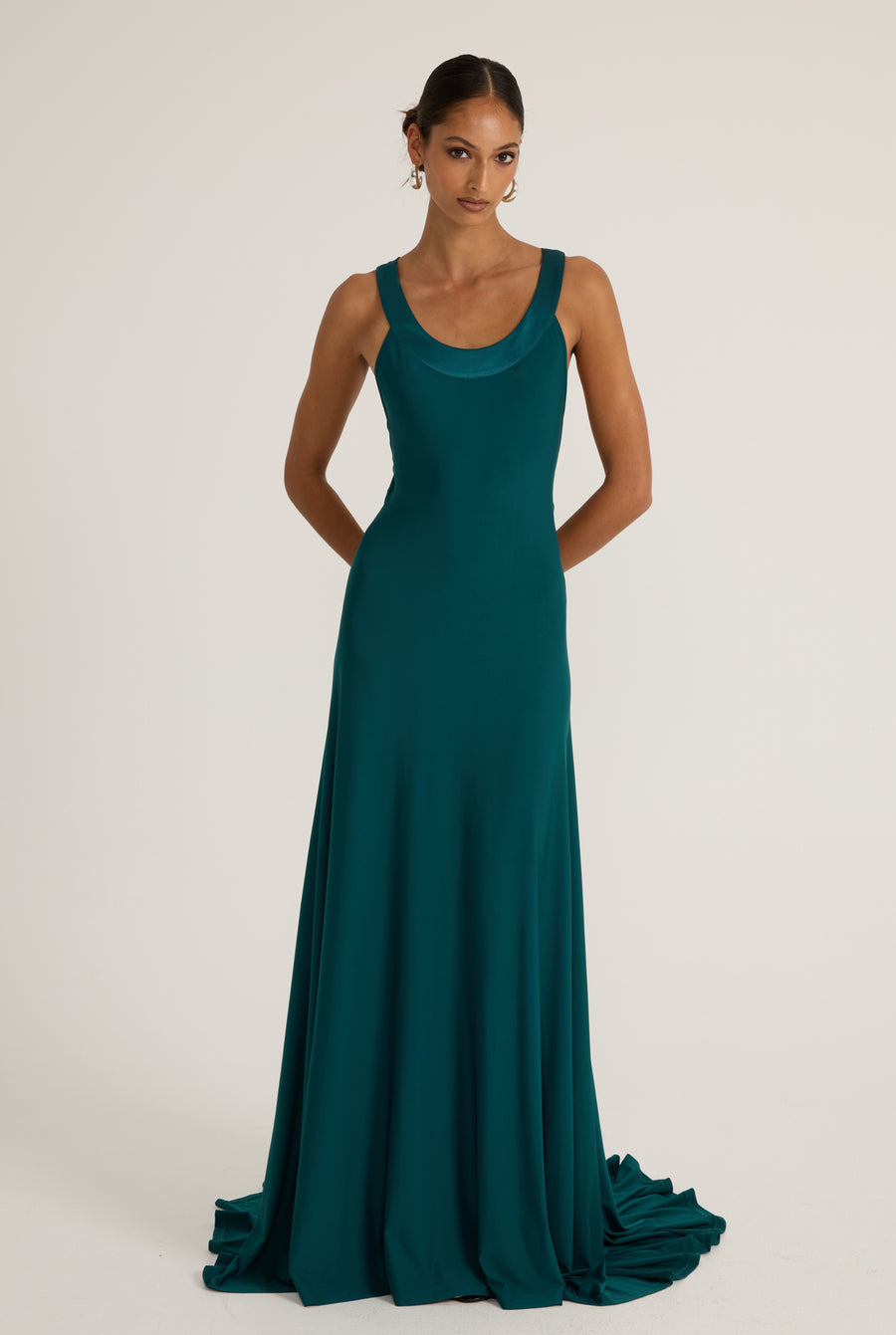Long teal gown with a keyhole satin cut out