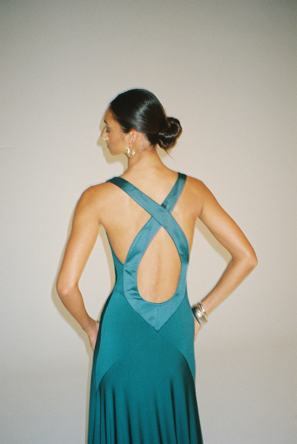 Teal evening gown with silk trim and a keyhole cut out