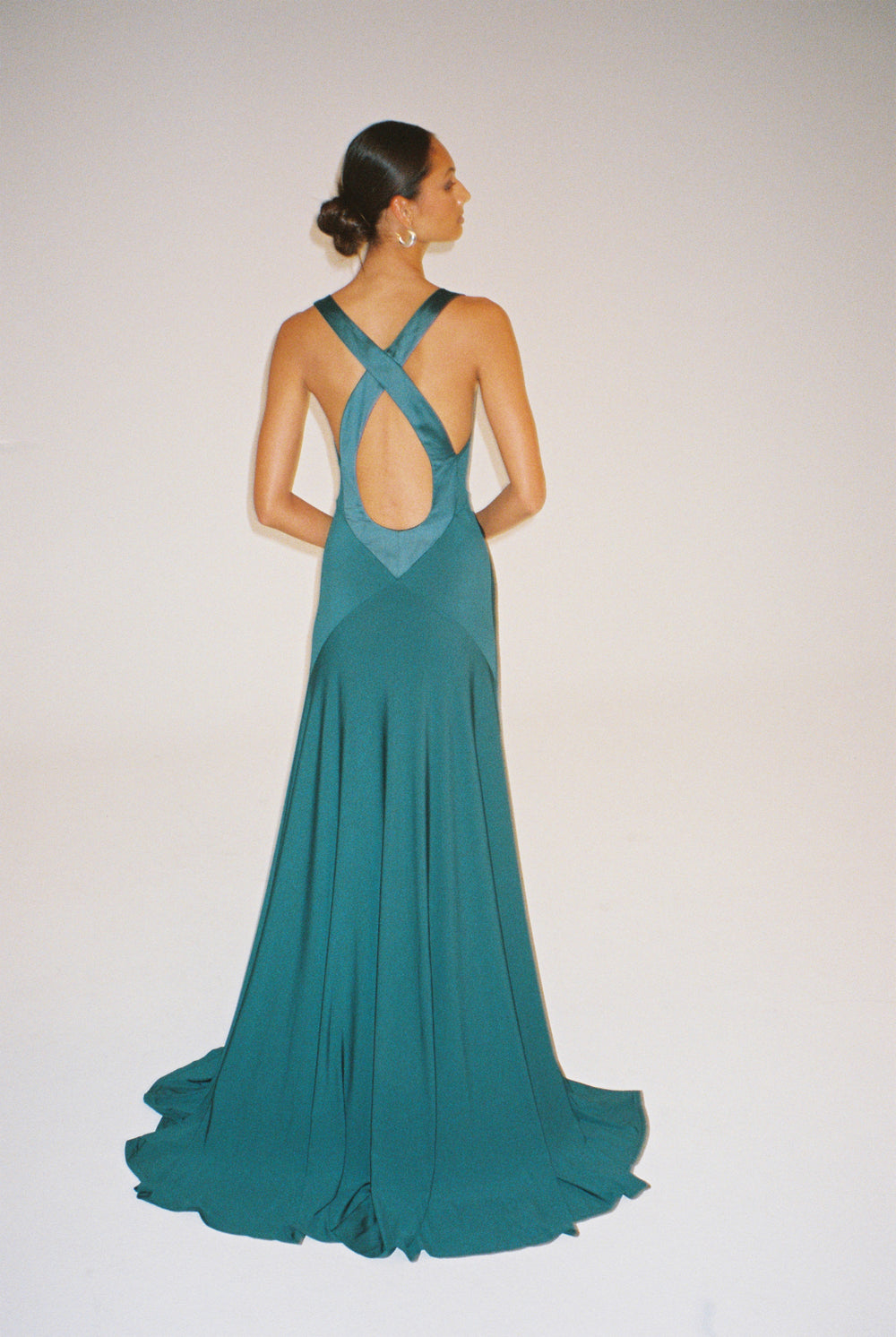 Teal evening gown with silk trim and a keyhole cut out