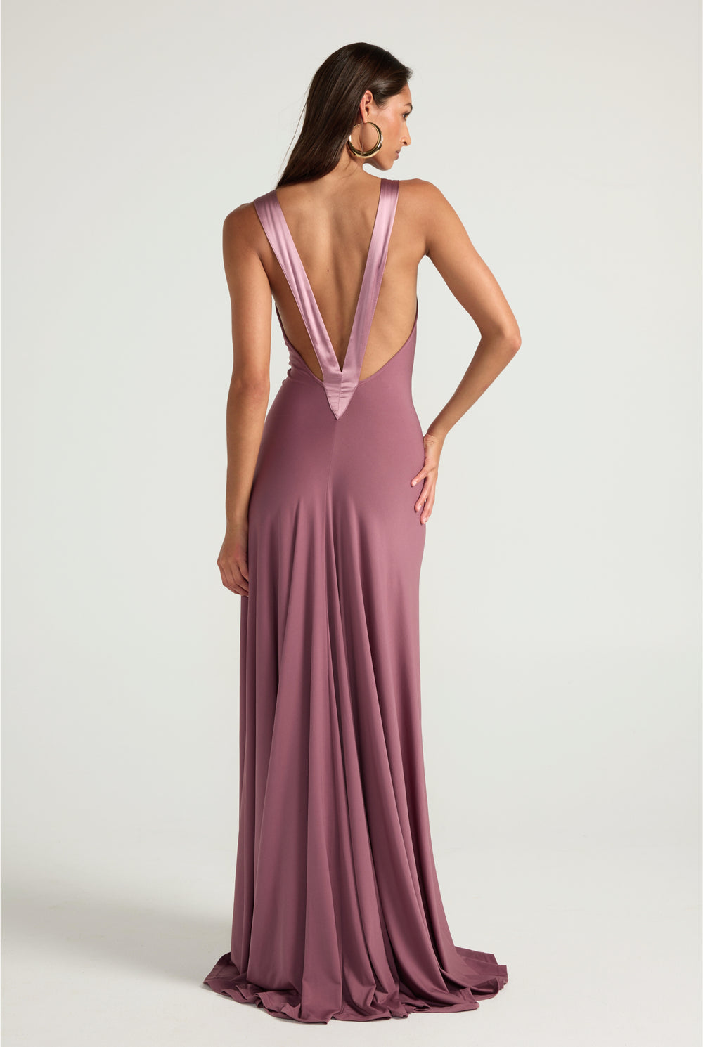 Long mauve gown with a deep plunging neckline