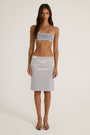 Silver satin floral top and silver midi skirt
