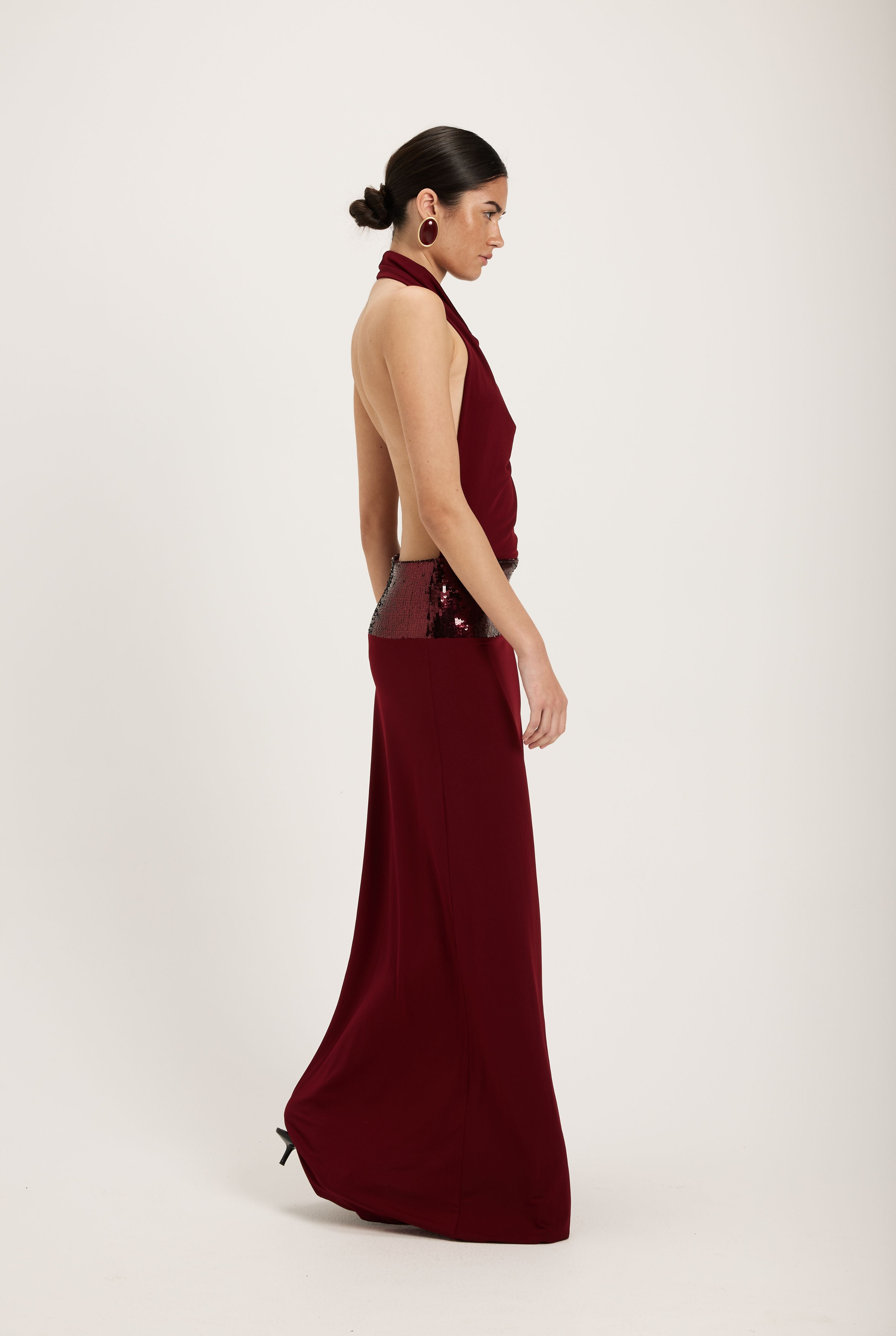 Burgundy evening gown with a sequin waist
