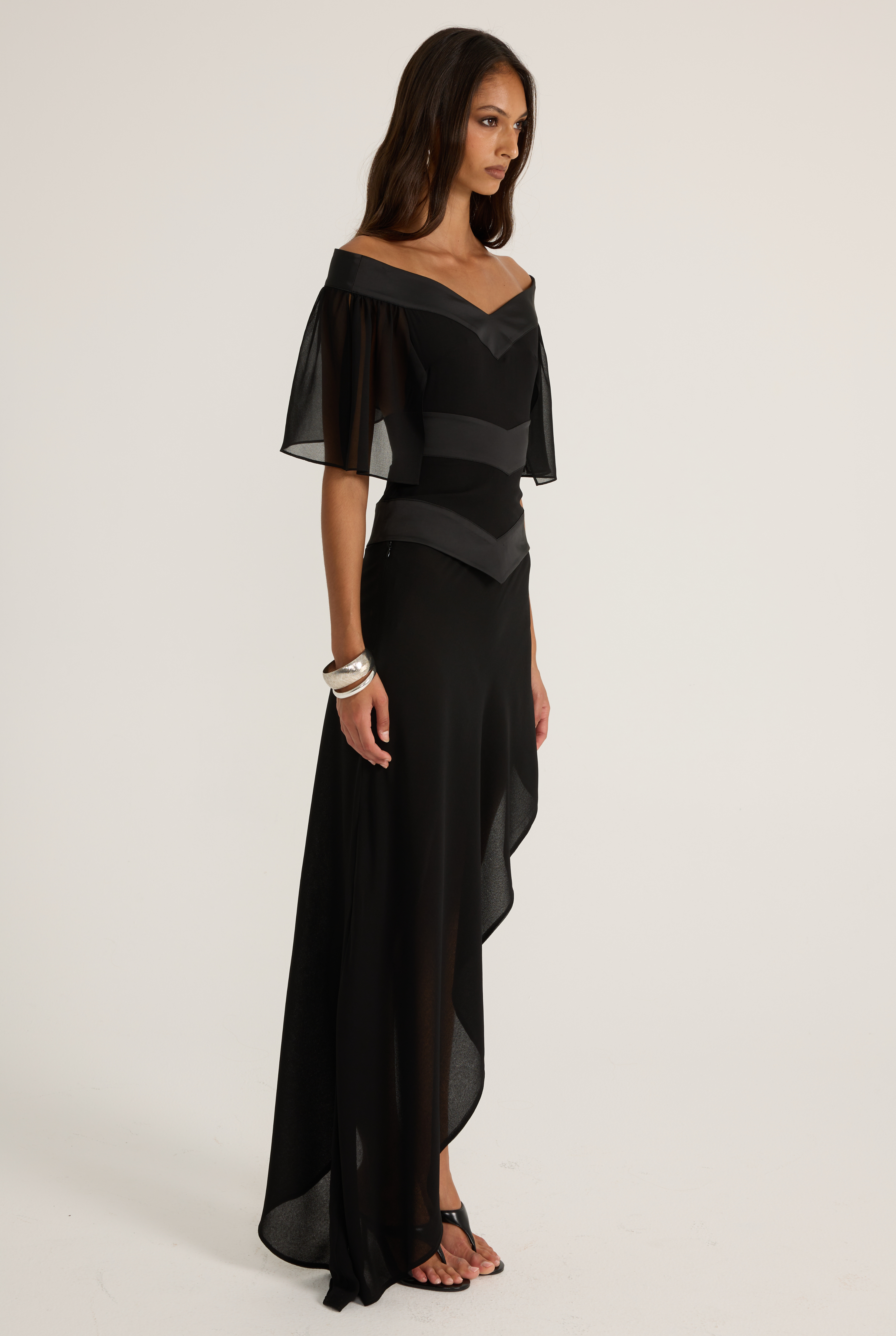 Black off-shoulder top and skirt with silk and chiffon